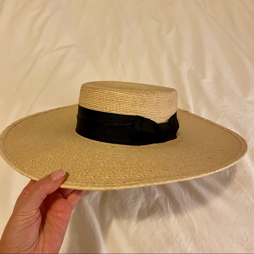 Stetson wide brim straw hat with black bow